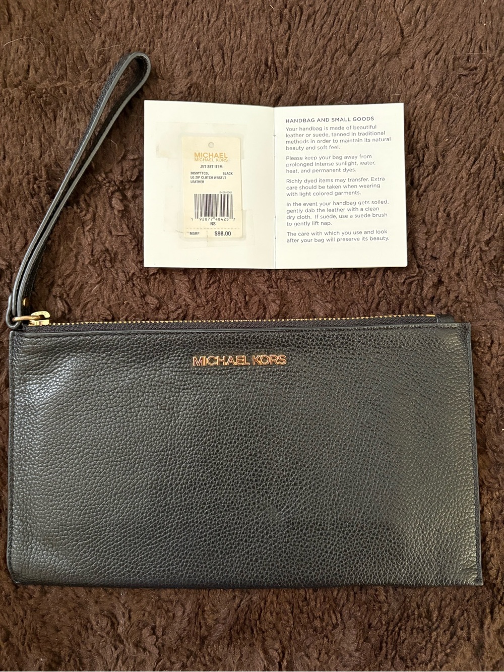 MICHAEL Michael Kors Black Pebbled Leather Wristlet with Gold Logo